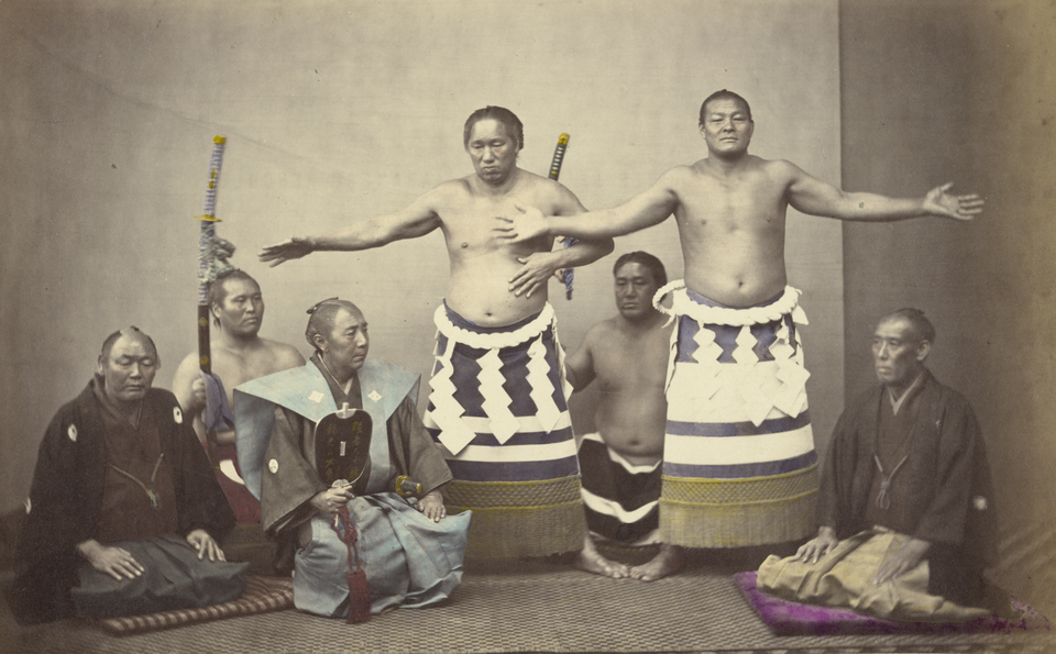 Photograph from 1869 of two yokozuna wearing ceremonial ropes and aprons.